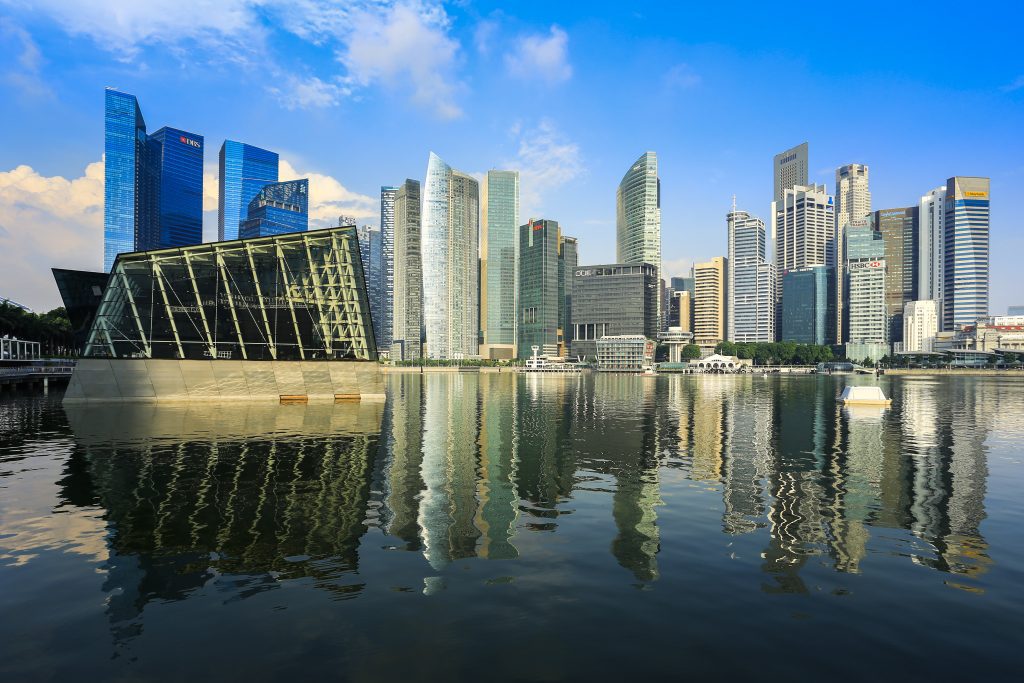 singapore business buildings with reflection HPPeF0eunGl 1