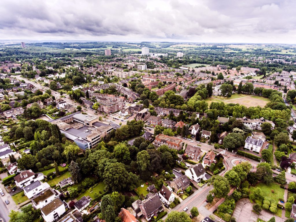 graphicstock aerial view of dutch town private houses streets and roundabout green park with trees S H6ZiOBGZ