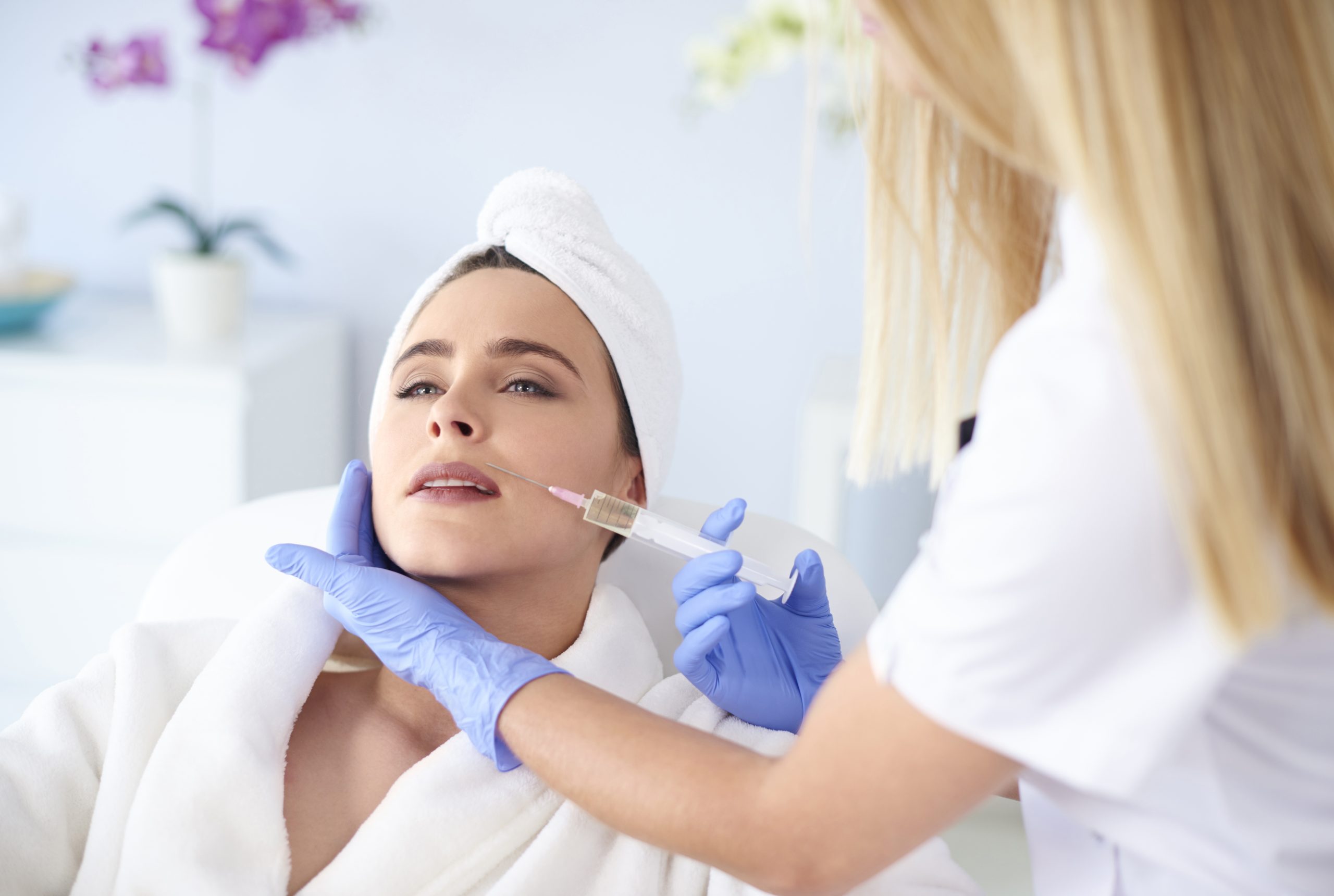 storyblocks woman at salon of medical aesthetics SDZTxJbFqM scaled