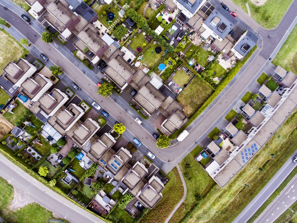 graphicstock aerial view of dutch street with white houses and cars netherlands H EcVjdBzb